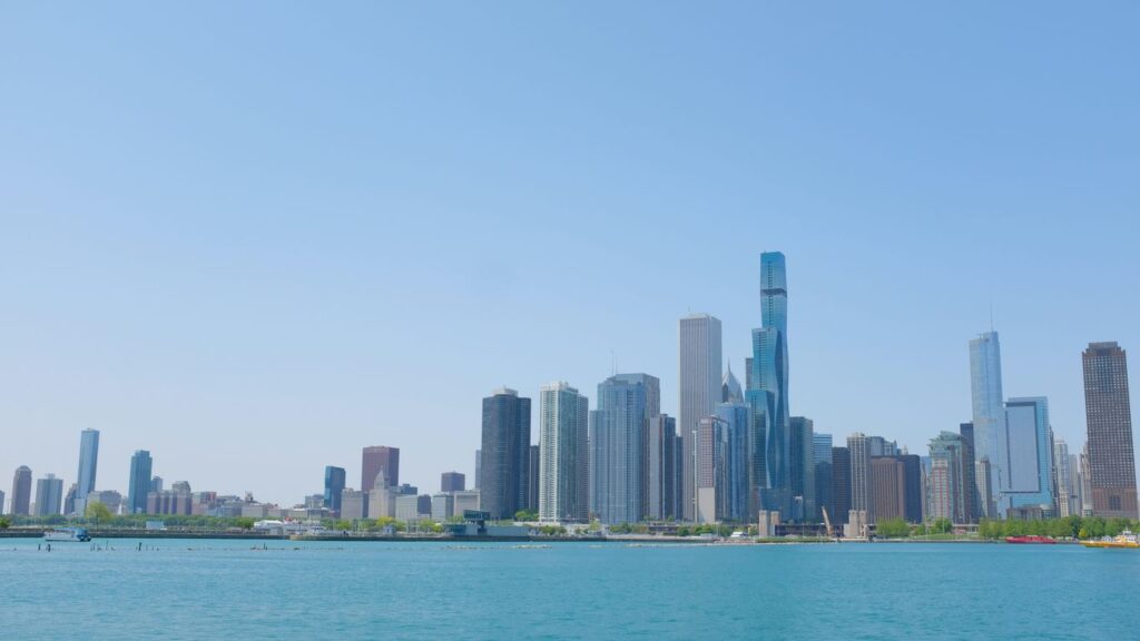 A large body of water with a city in the background