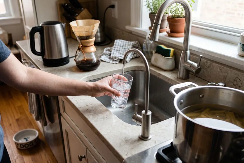 Glass of water from a 9-stage reverse osmosis tap in a Chicago kitchen